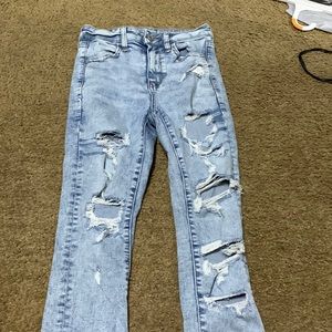 AE ripped blue jeans